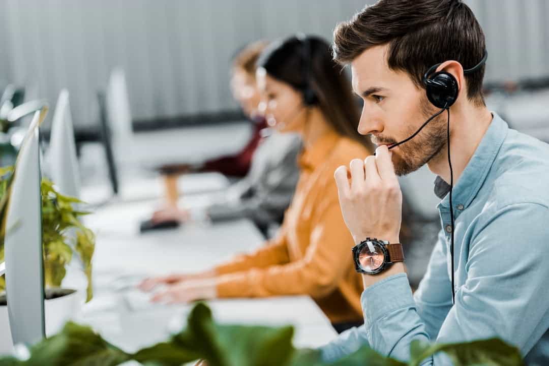 Call center operators working in the office