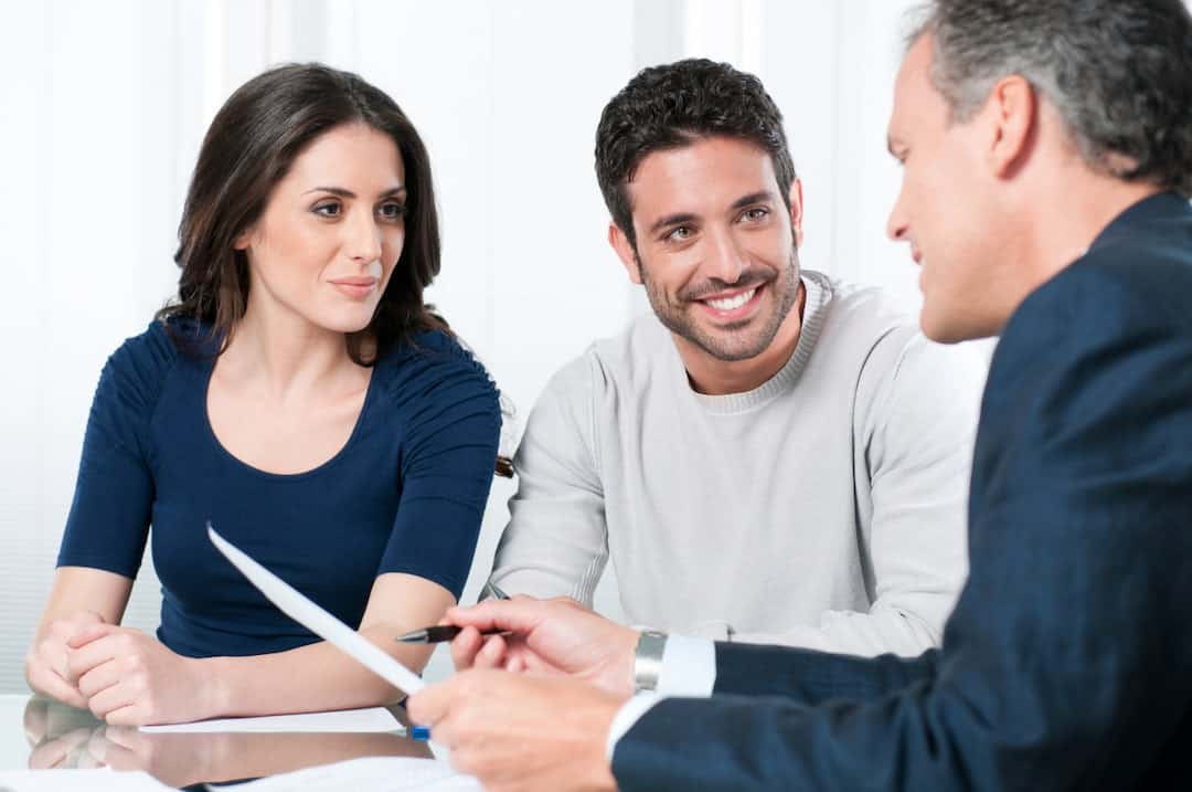 a couple at the meeting with a consultant 