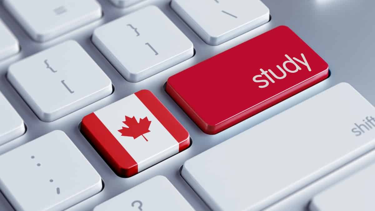 Key STUDY and the flag of Canada on the keyboard 