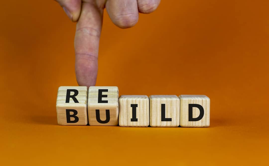 Rebuild word made of letters on wooden cubes 