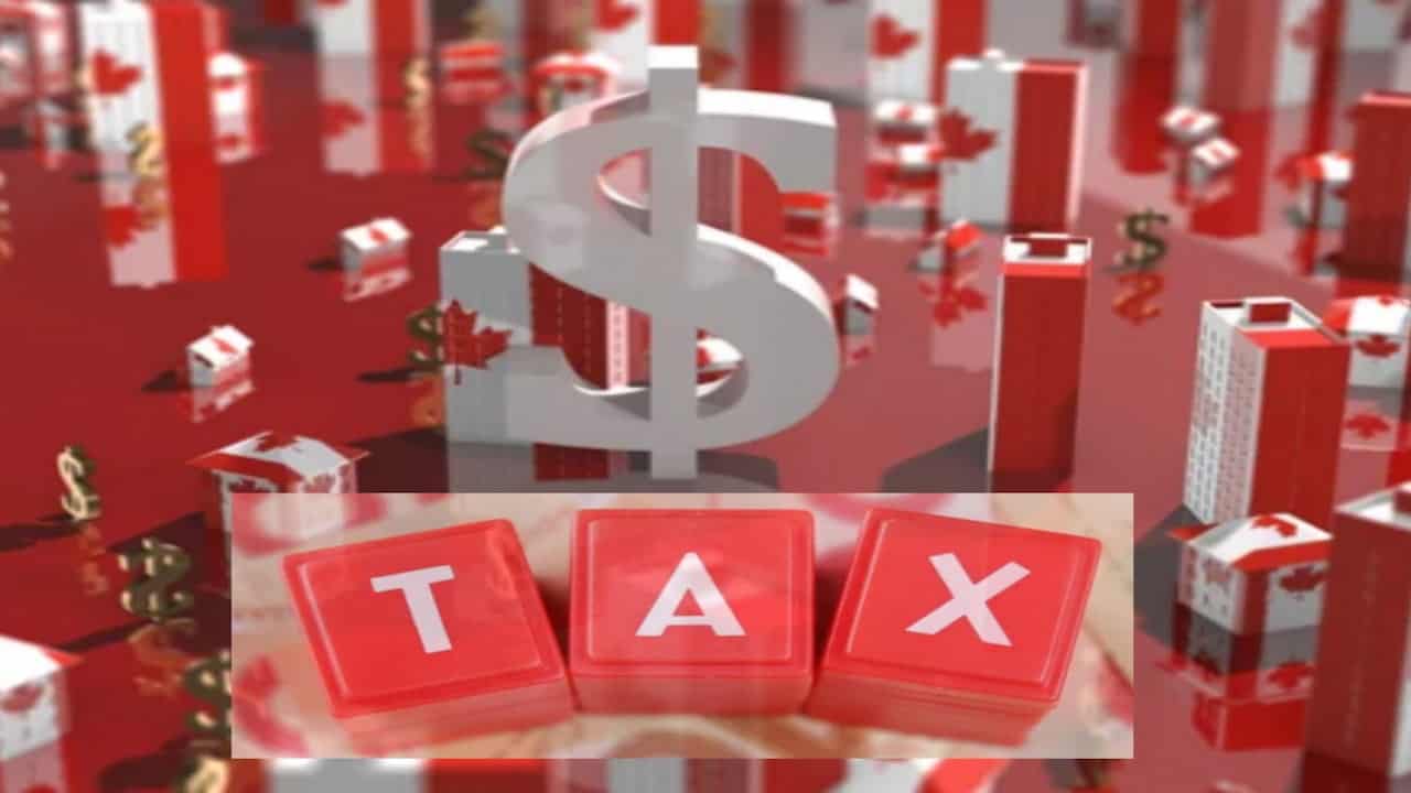 Canadian flags, a dollar symbol and the TAX word on red cubes