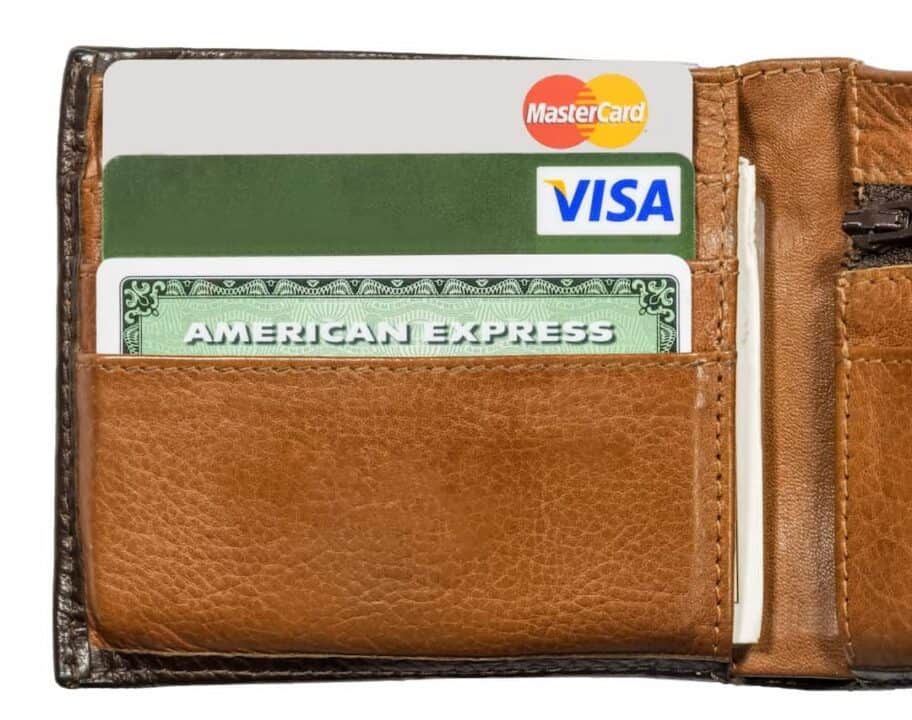 credit cards sorted in a brown leather wallet