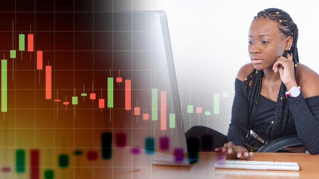 woman at work and stock graph