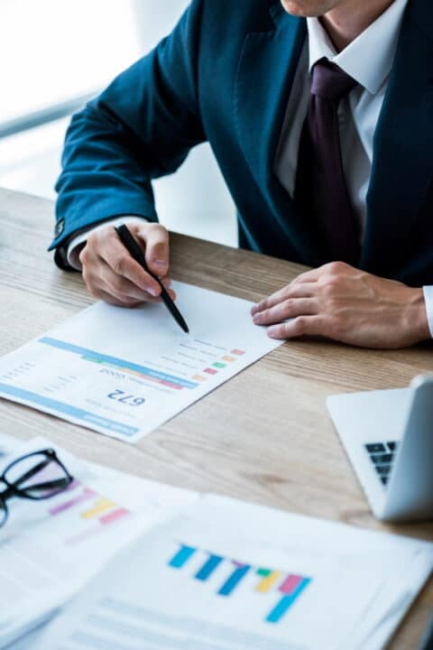 a man calculating in the office