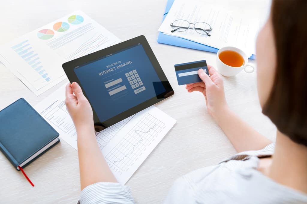 a woman using internet online banking