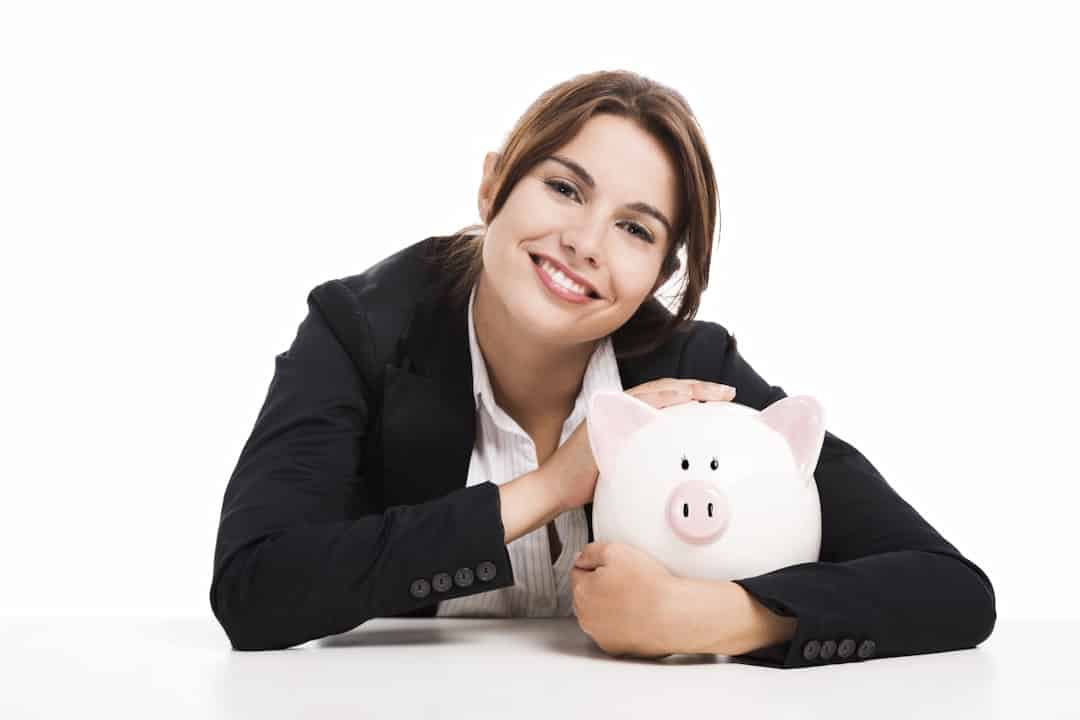 a woman with a piggy bank