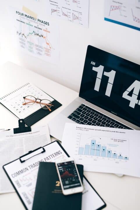 papers and devices on the work table